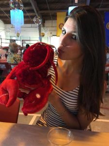 Alicia Linklater posing with plush lobster at rotary lobsterfest - june 2018