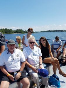 Alicia Linklater smiling in group photo on midland rotary club boat trip