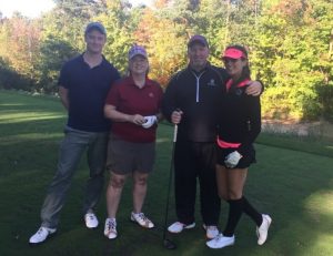 Alicia Linklater and Mike Penny featured in group photo at CIBC golf tournament 2016