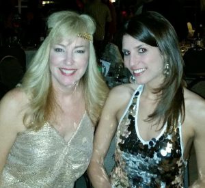 Alicia Linklater and Joan Kelso smiling together in photo at rotary club of barrie huronia disco fever gala - march 2015