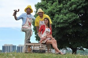 Alicia Linklater posing in group photo holding lobster at 36th annual barrie huronia rotary club lobsterfest - june 2014