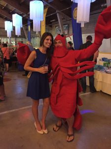 Alicia Linklater smiling in photo with lobster mascot at rotary club of barrie 37th lobsterfest - june 2015