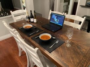 Virtually celebrating new year's eve at table with computer video call