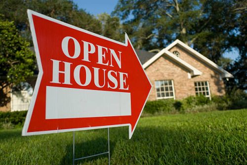 Open House sign with arrow and white space.